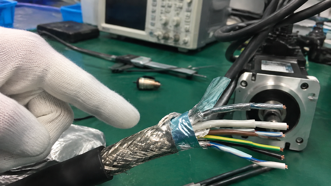 Close-up view of a double-shielded servo cable cross-section